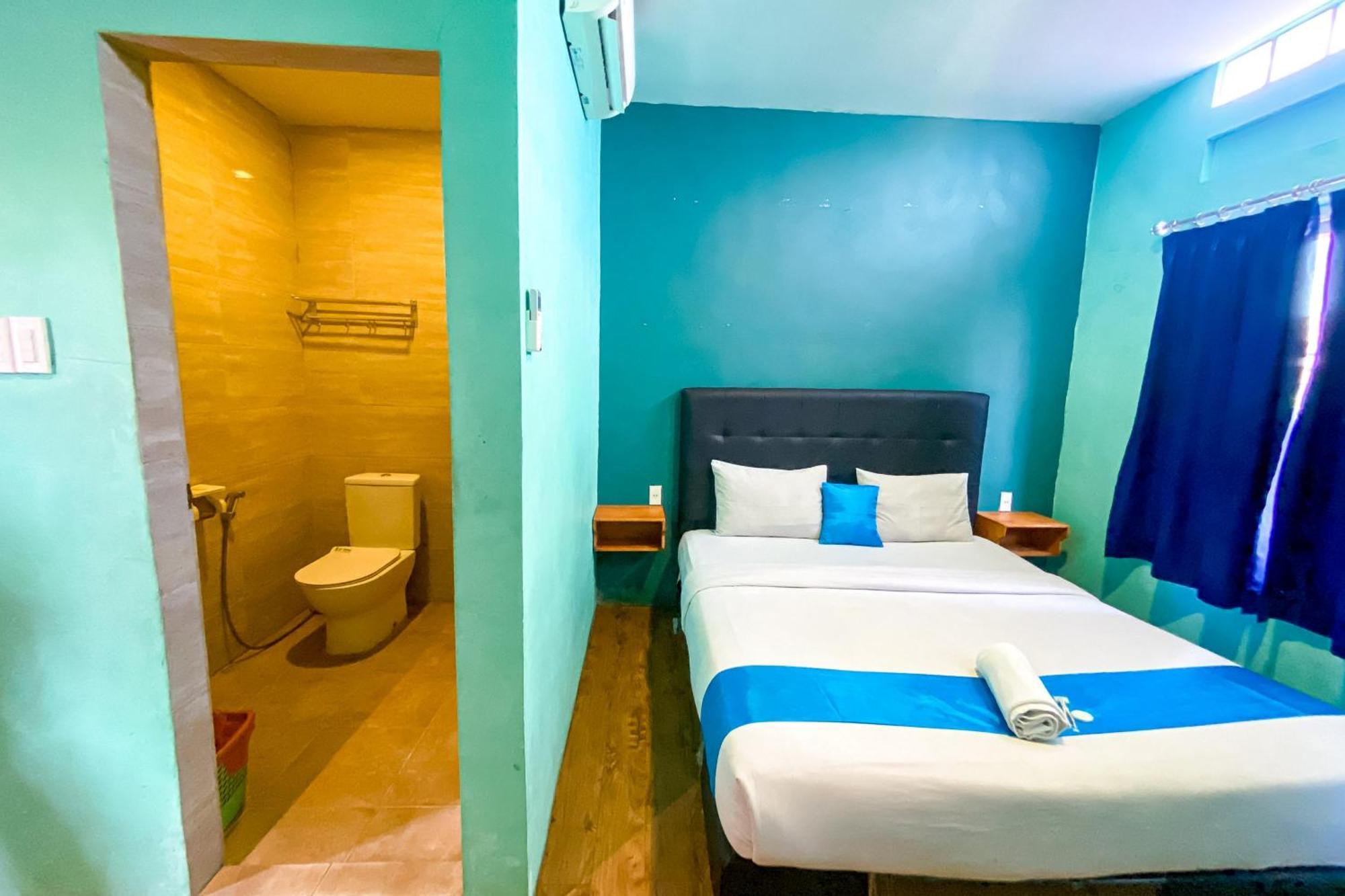 Отель Reddoorz At Sentosa Jaya Helvetia Медан Экстерьер фото