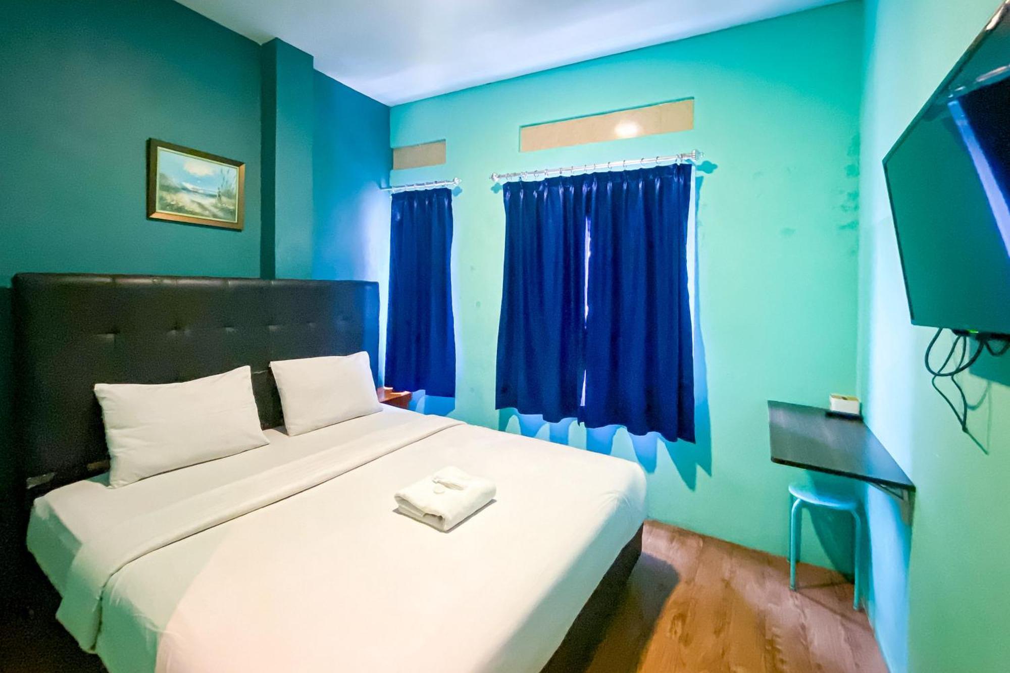Отель Reddoorz At Sentosa Jaya Helvetia Медан Экстерьер фото