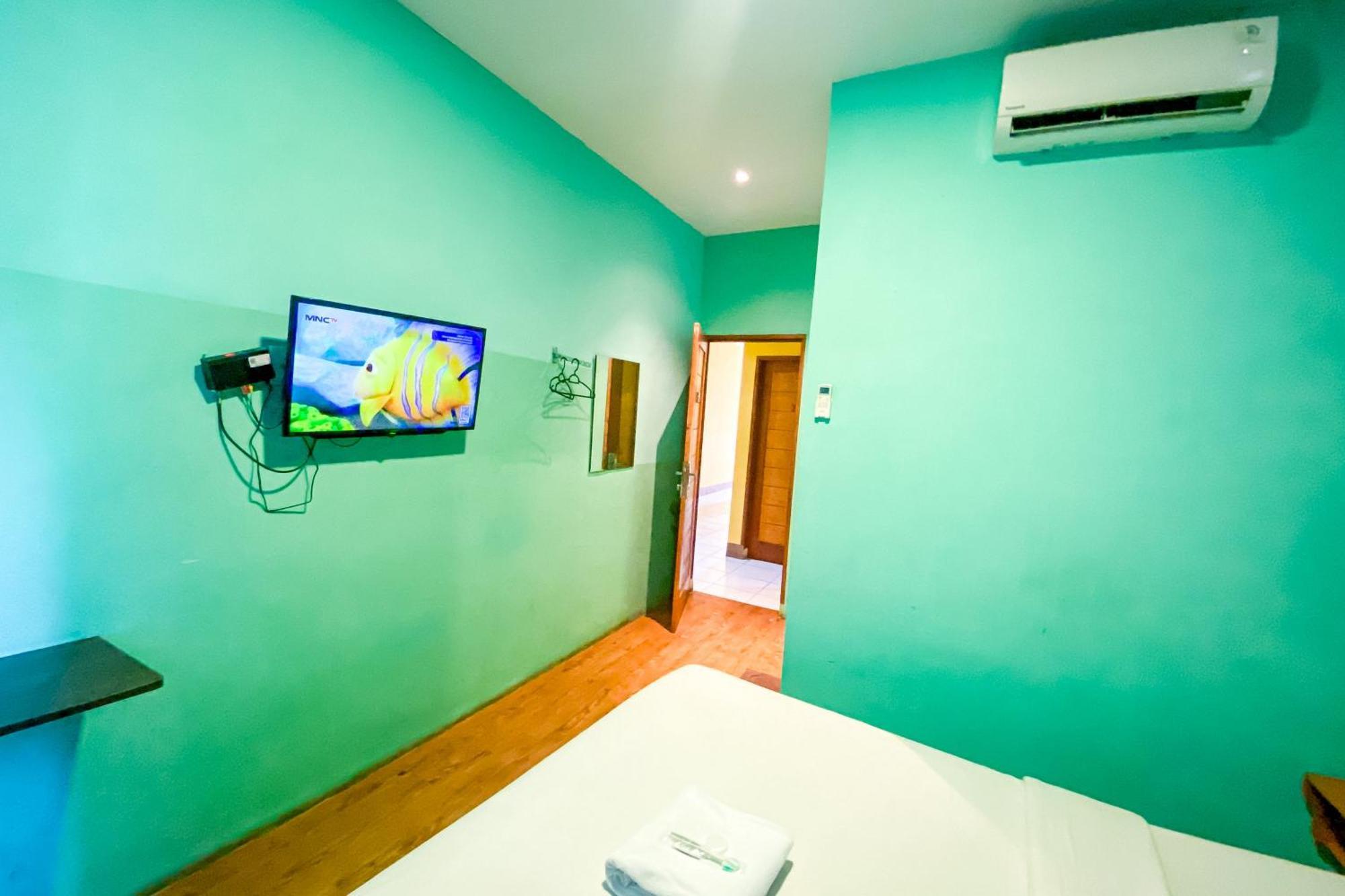 Отель Reddoorz At Sentosa Jaya Helvetia Медан Экстерьер фото